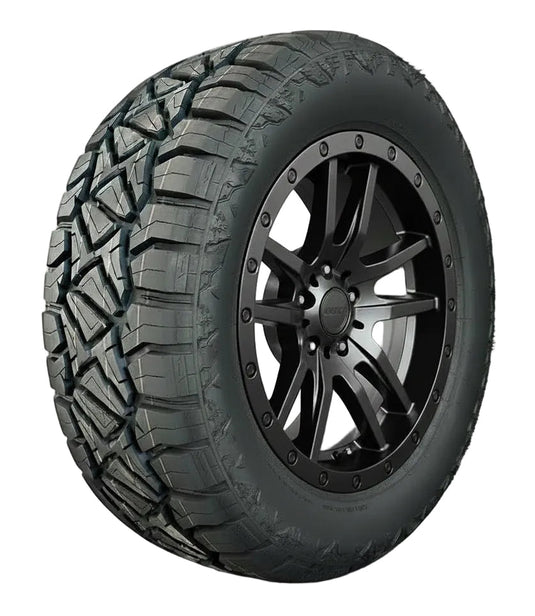 A black all-terrain tire mounted on a black multi-spoke wheel, shown at a three-quarter angle on a solid white background.