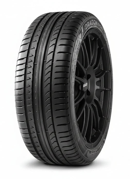 A black Pirelli Dragon R1 tire mounted on a black multi-spoke alloy wheel, shown from a three-quarters angle on a white background.